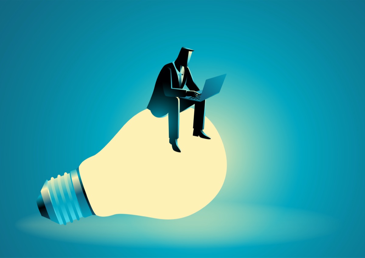 freepik-Businessman_Silhouette_Sitting_On_Bulb_Working