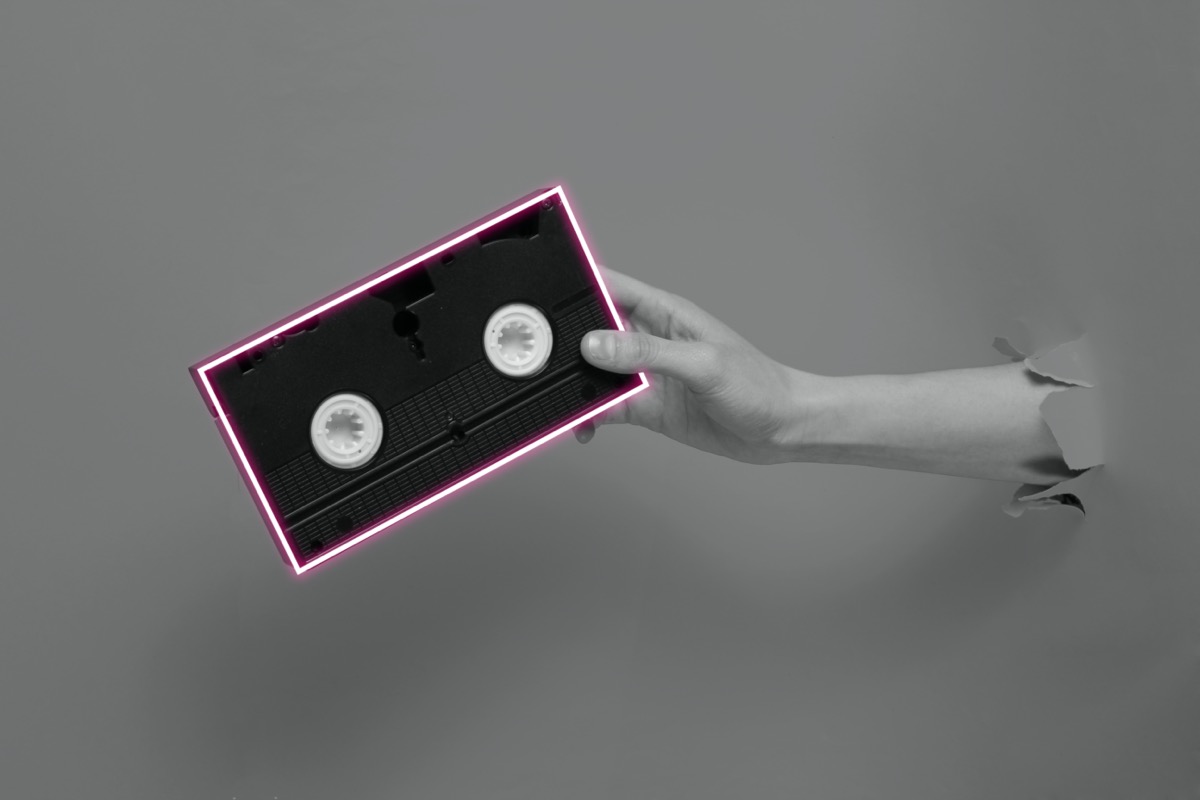 freepik-female-hand-holds-video
