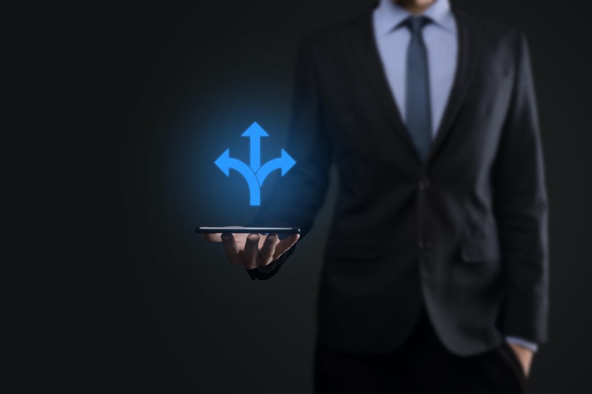 freepik-businessman-in-a-suit-holds